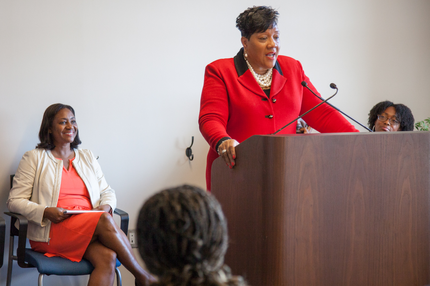 W.K. Kellogg Foundation Program Office Jeanne Wardford speaks at a press conference announcing its partnership with the U.S. Small Business Administration (SBA) and Justine Petersen to expand access to entrepreneurial education and microloans for formerly incarcerated individuals, especially those who are parents. La June Montgomery Tabron, WKKF president and CEO, (left) and SBA Associate Administrator Tameka Montgomery (right)look on