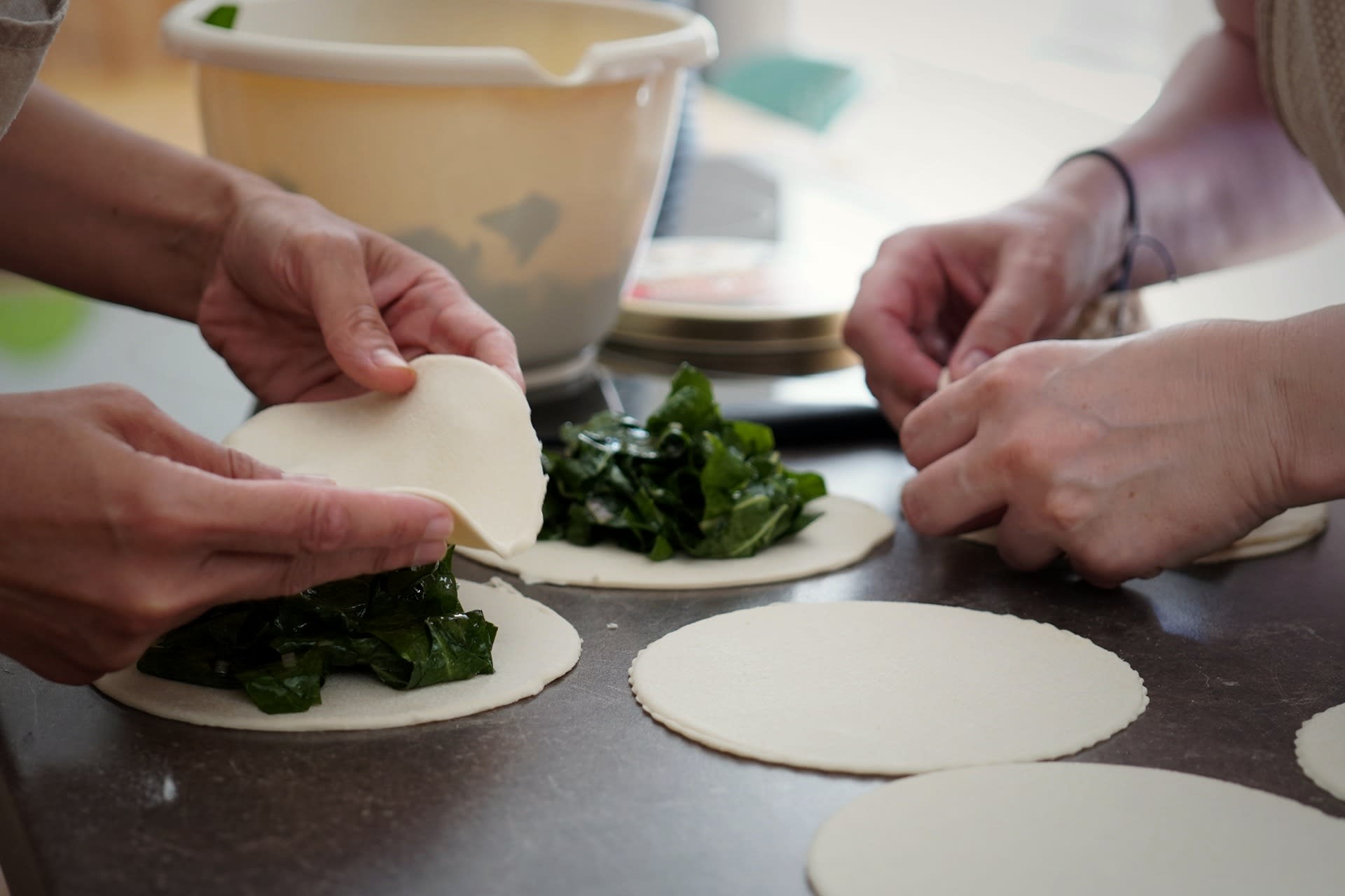 People learning how to prepare authentic local Croatian delicacies