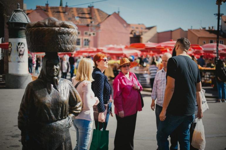 People at Dolac farmers market looking for ingredients for a typical local Croatian lunch