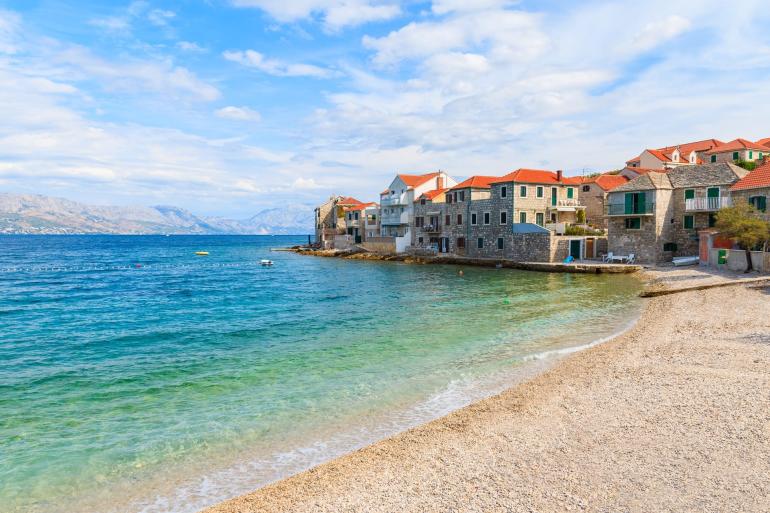 Beachfront in small fishing village in Postira, Croatia