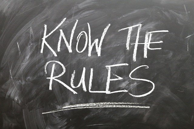 Chalkboard with 'Know The Rules' written on it