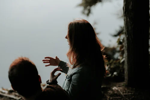 Woman sharing NA message with addict