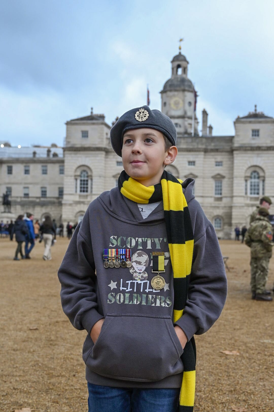 A Scotty member proudly wears his father's medals at the Remembrance parade