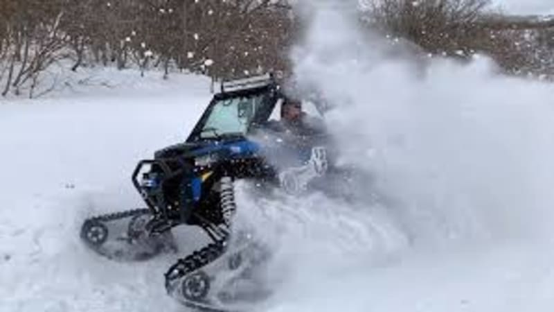 Polaris RZR with Snow Tracks - 1000 CC