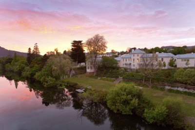 The Woodbridge heritage mansion on the River Derwent at sunset, New Norfolk
