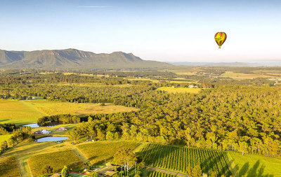 Hot air balloon flying over the Hunter Valley