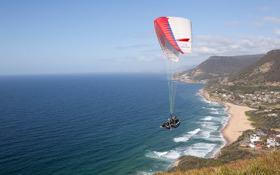 Tandem paragliding over Stanwell Park