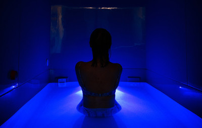 Woman in floatation tank