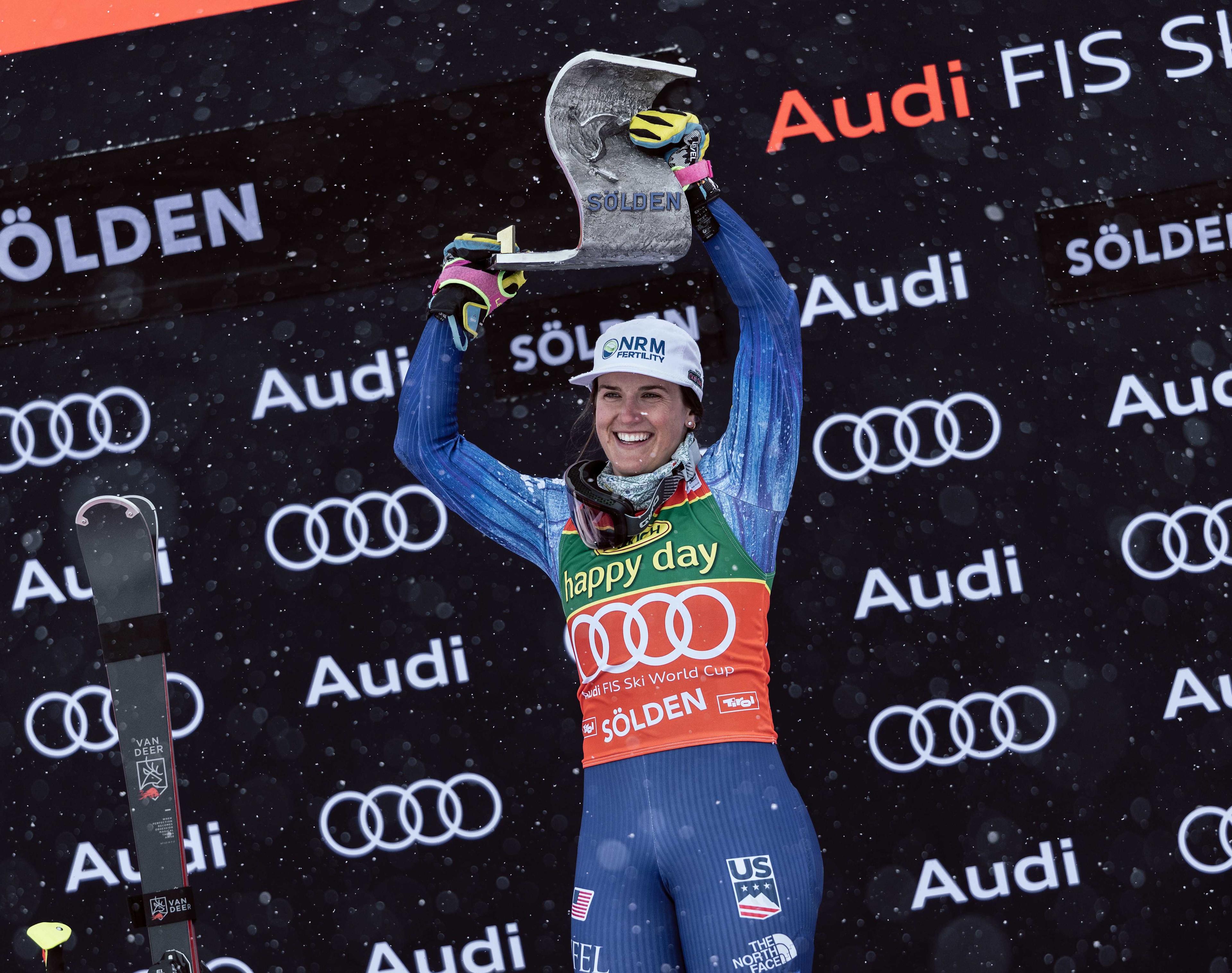 Paula Moltzan lifts the winner's trophy during the award ceremony of the Audi FIS Ski World Cup Giant Slalom in Sölden.