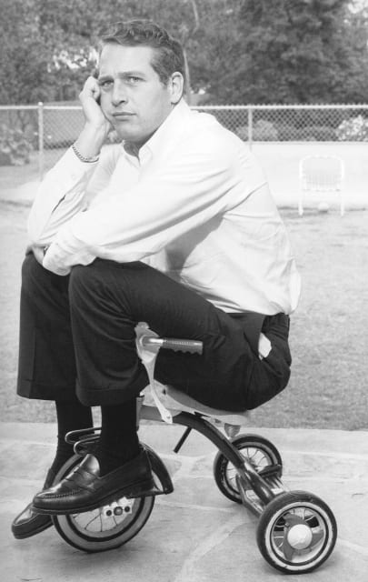 Paul Newman on a tricycle