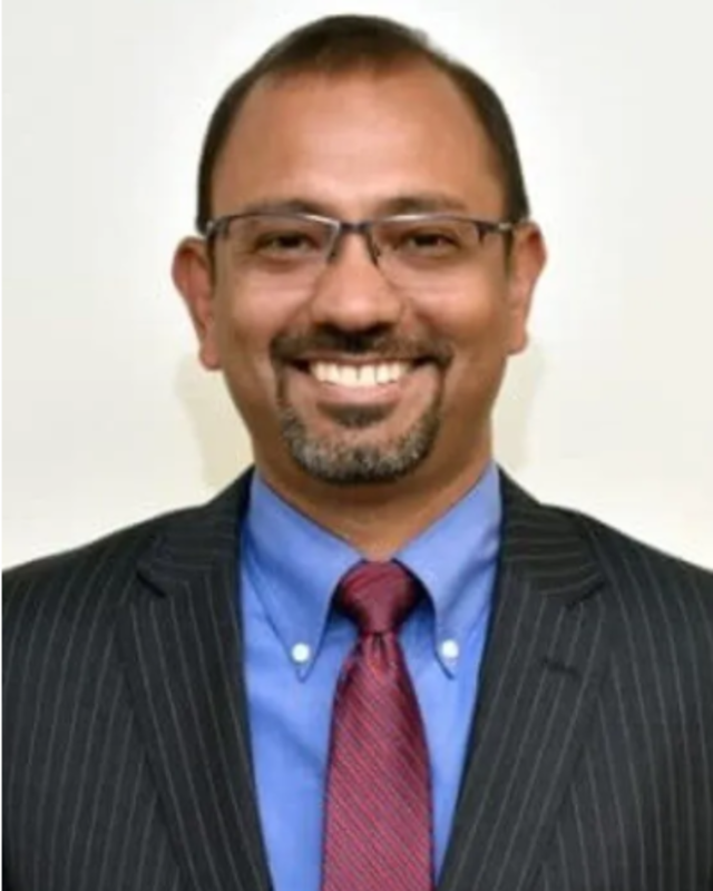 Dr. Arshad William