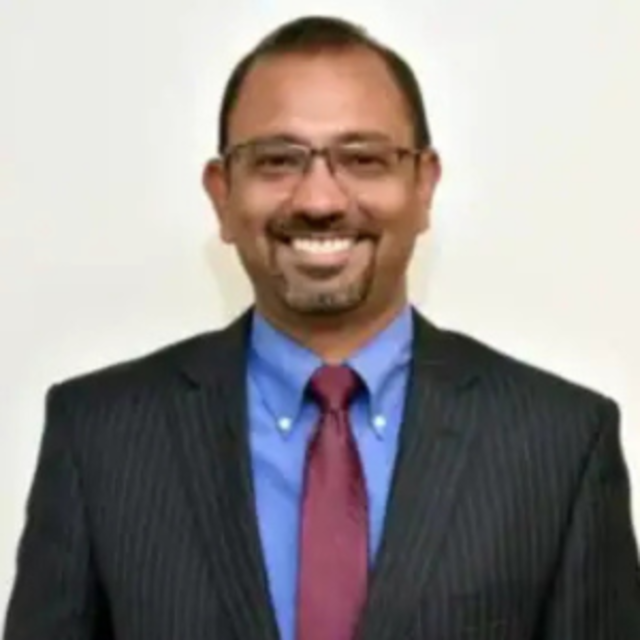 Dr. Arshad William