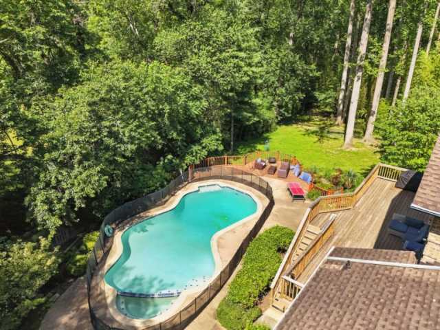 Unwind by the Backyard Pool