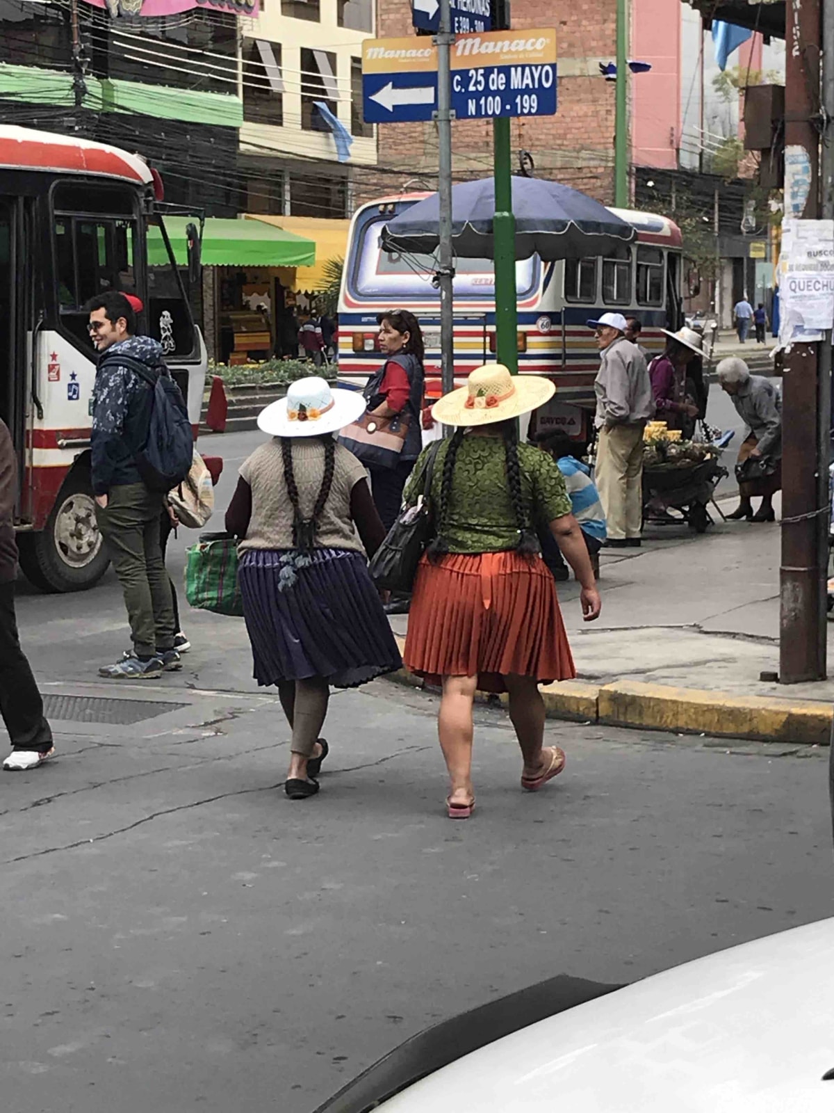 Racy cholitas in Cochabamba with their short skirts and sunhats.