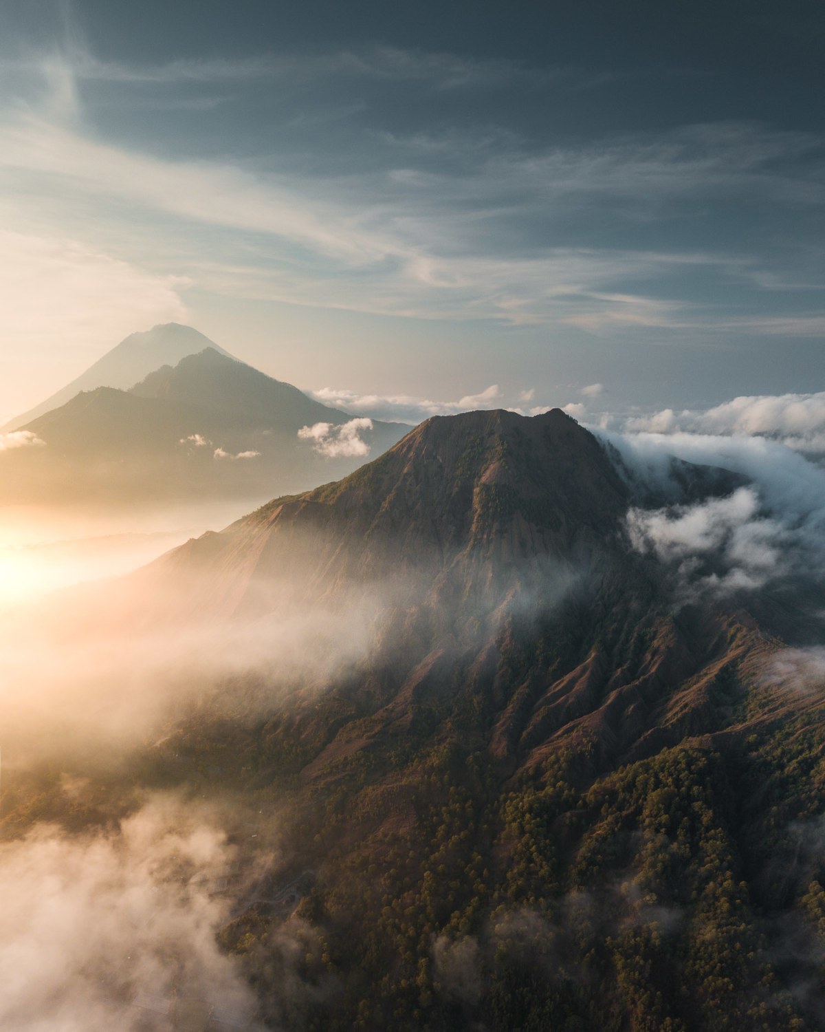 Pinggan views of morning light with clouds, volcanic sights and wild colours