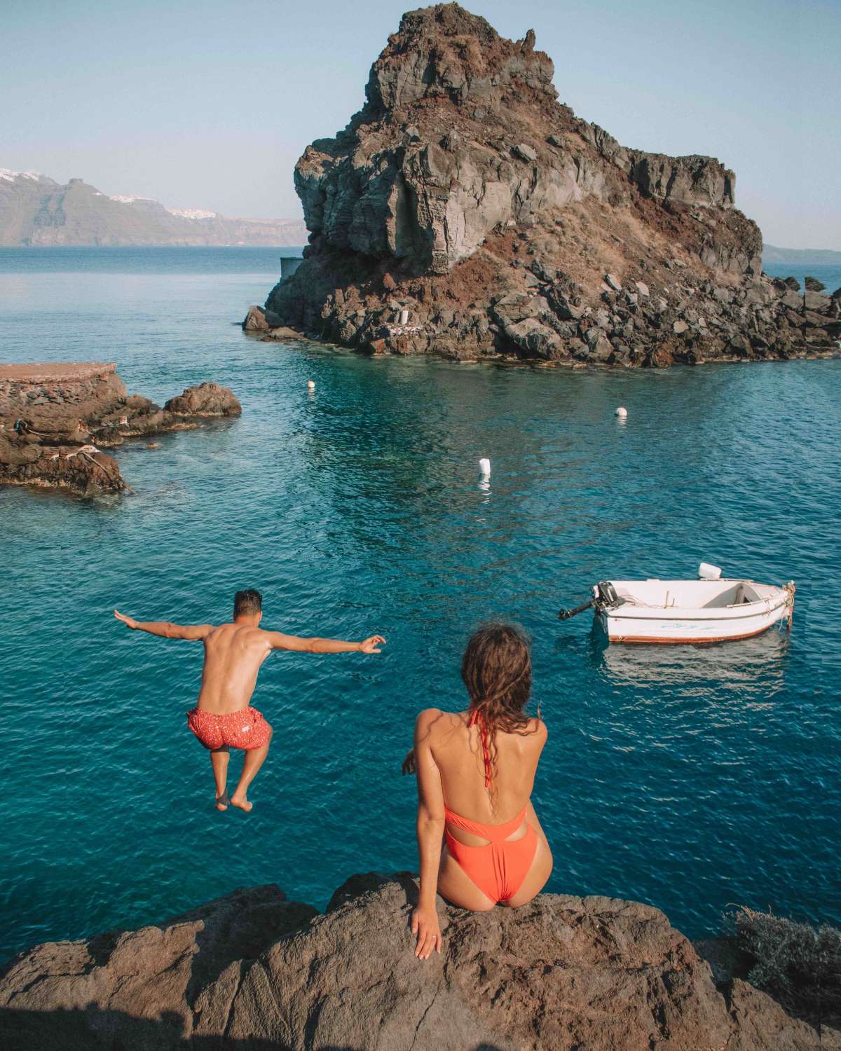 Cliff jumping at Amoudi Bay.