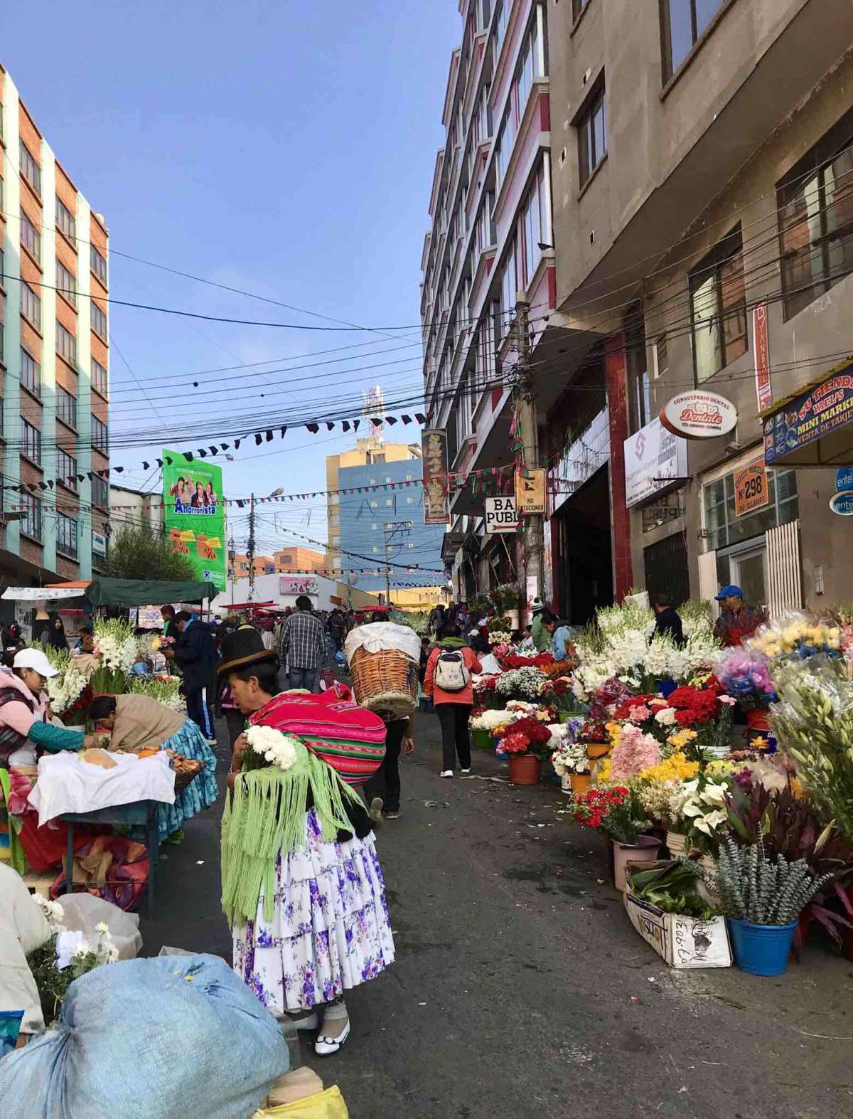 A cholita shopping at Mercado Rodriguez