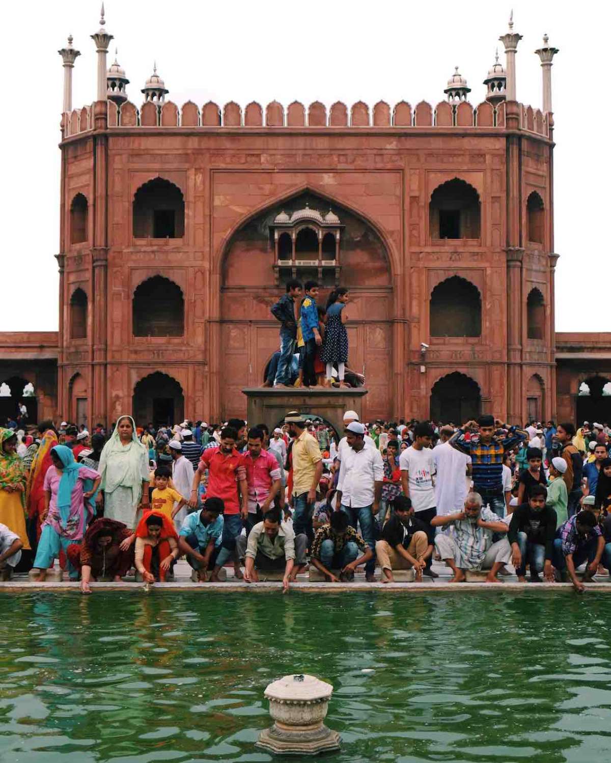 People wash before praying at Delhi’s Friday Mosque