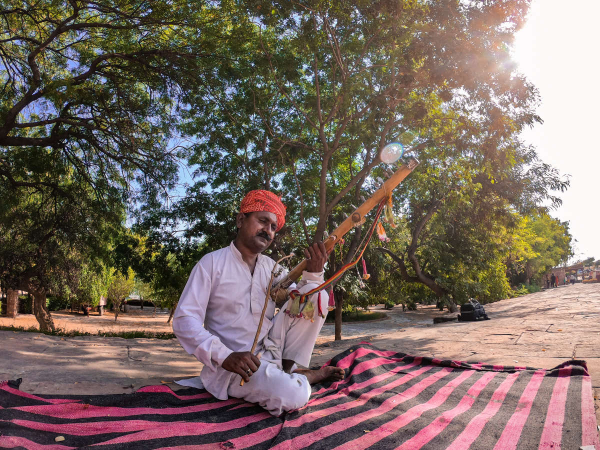 Local guy playing classical music at the entrance of Jaswant Thada