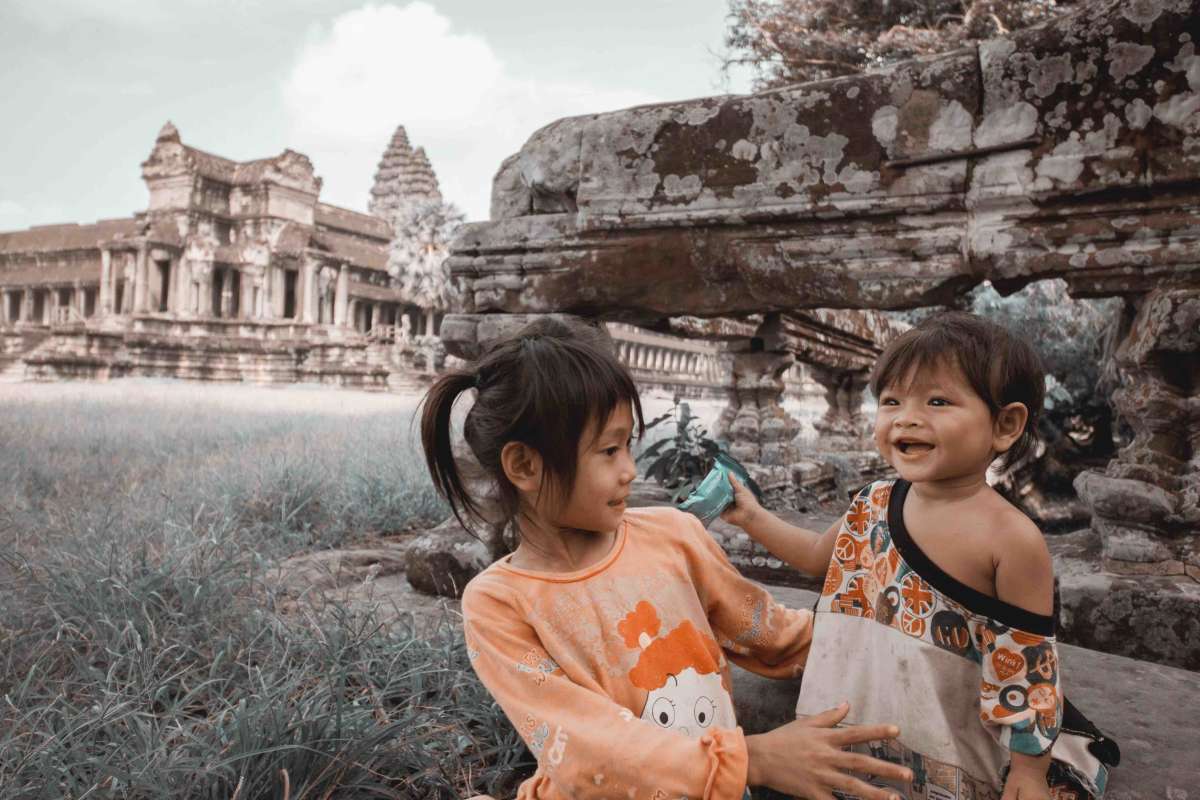 Cuties near Angkor Wat - this was one of my first real attempts at shooting human subjects and still i couldn\x27t help but include a ton of background!