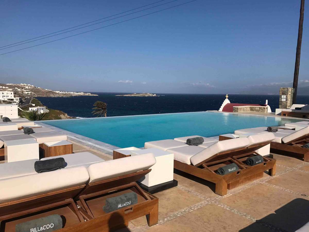 The hotel’s stunning infinite pool during the daytime.