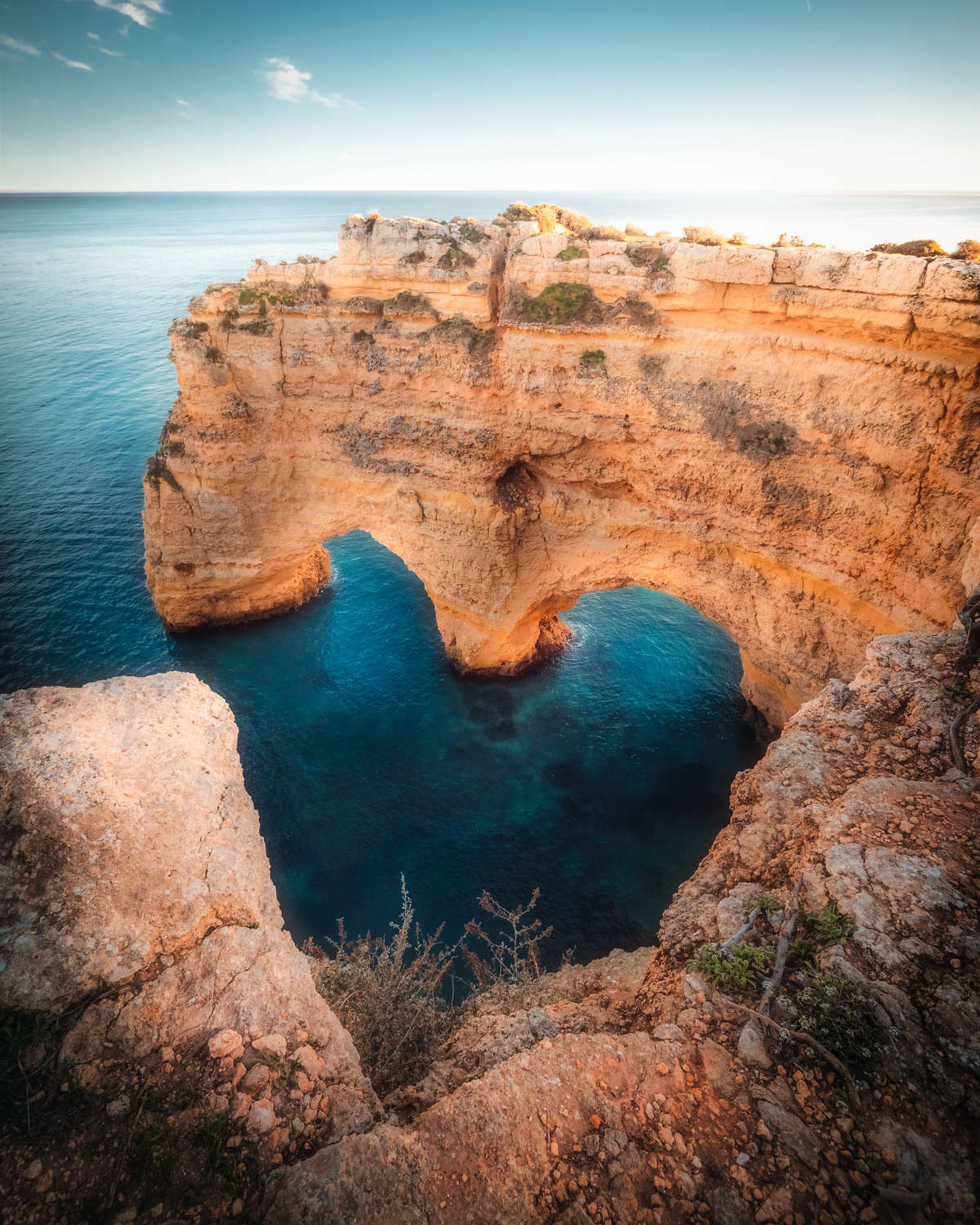 The natural heart shape hidden along the cliffy coastline at Marinha Beach