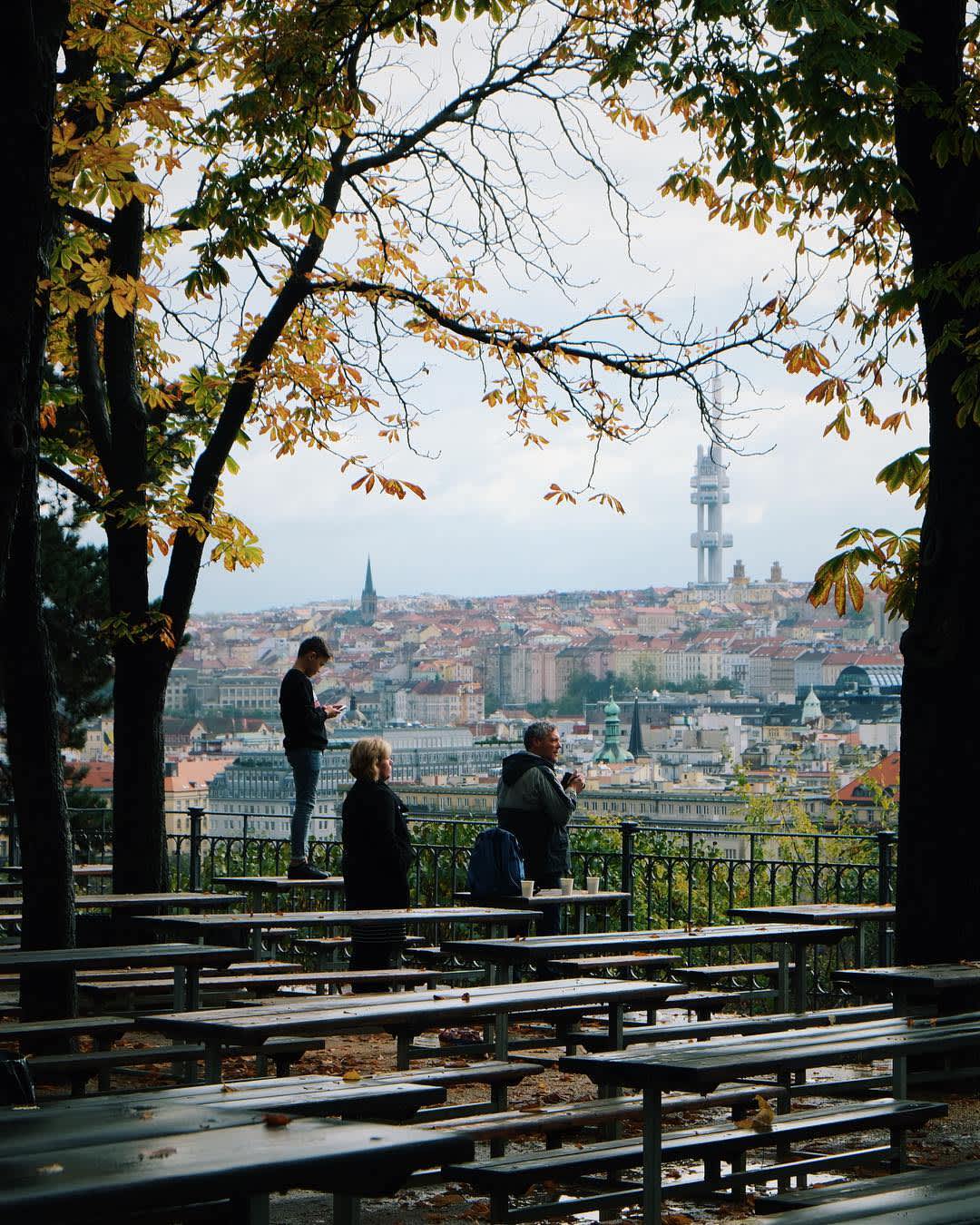 A family takes in the view at The Letna Beer Gardens