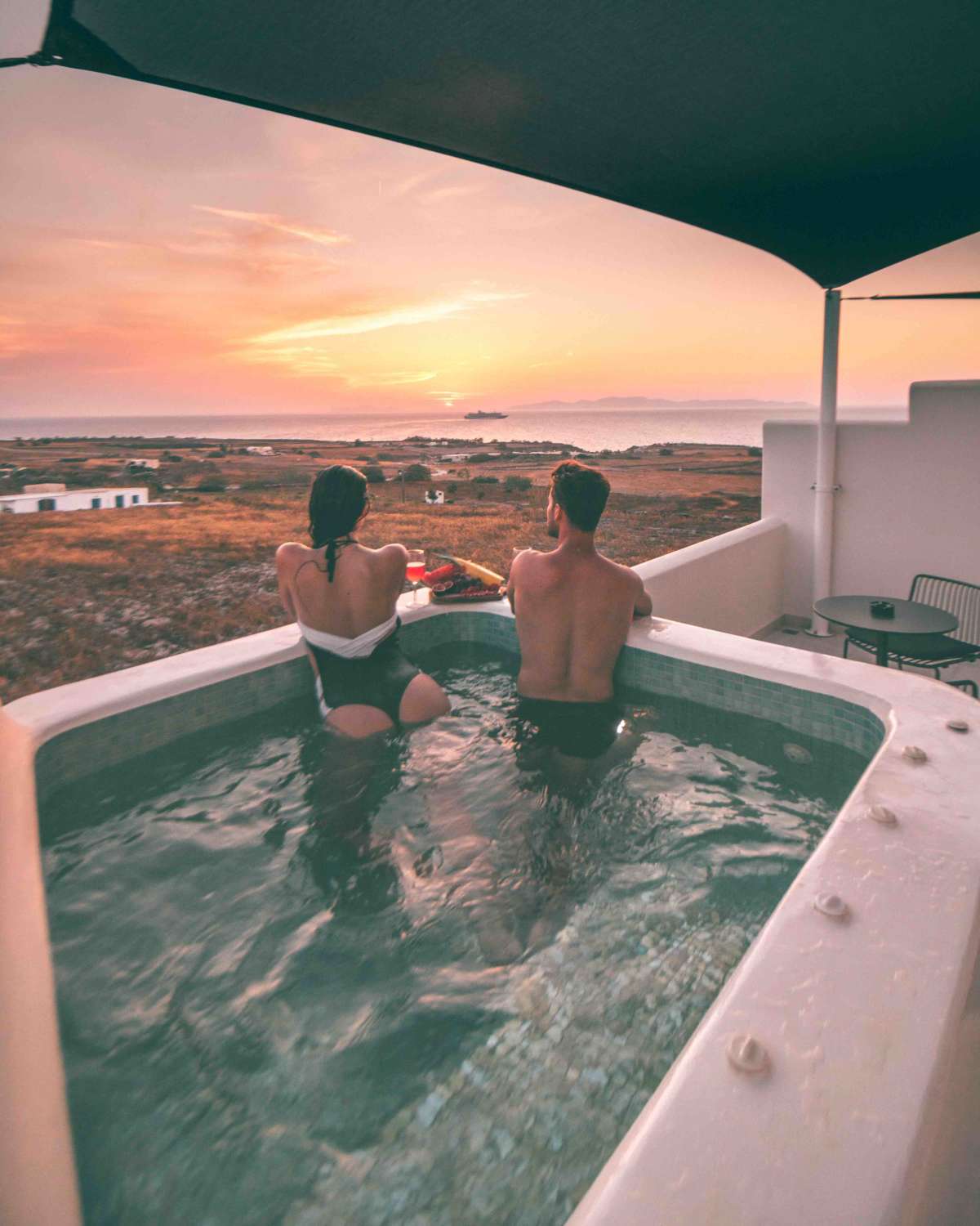 Watching the sunset from our private jacuzzi.