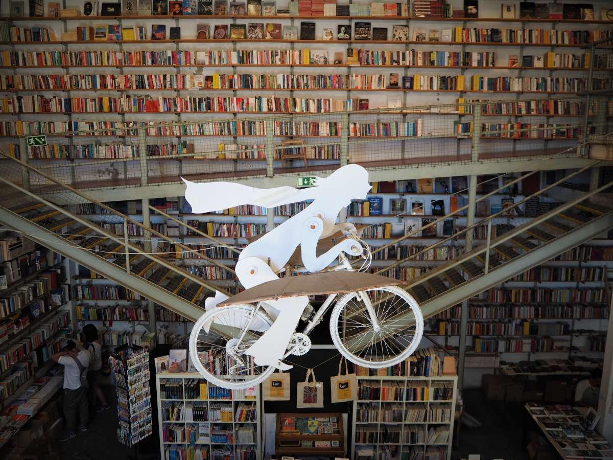 \x22Ler Devagar\x22 bookstore and its flying bicycle. 