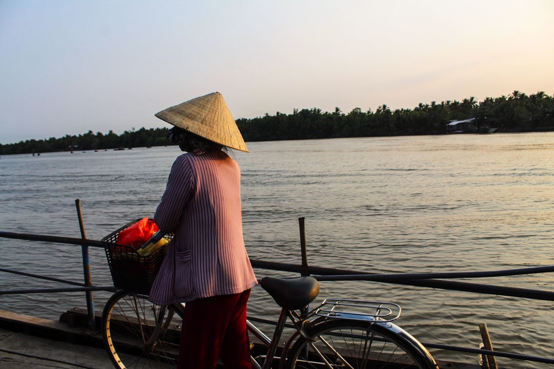 Woman wearing a typical conic hat