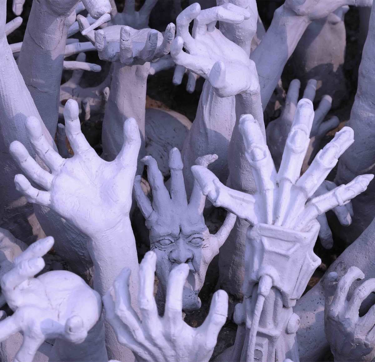 Face on a hand