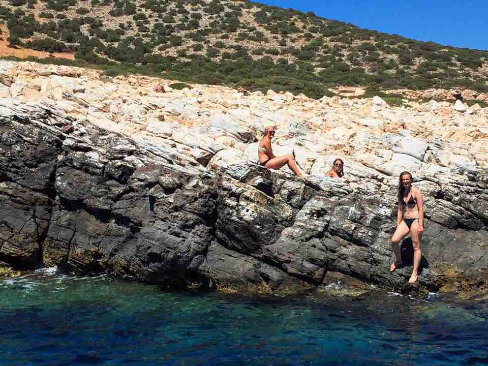 Our captain Dimitri threw three cans of beer to these ladies hanging on the rocks.
