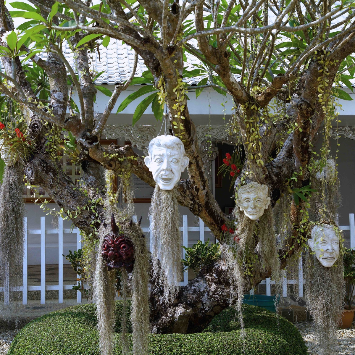 There are several trees with Villain heads hanging from the branches