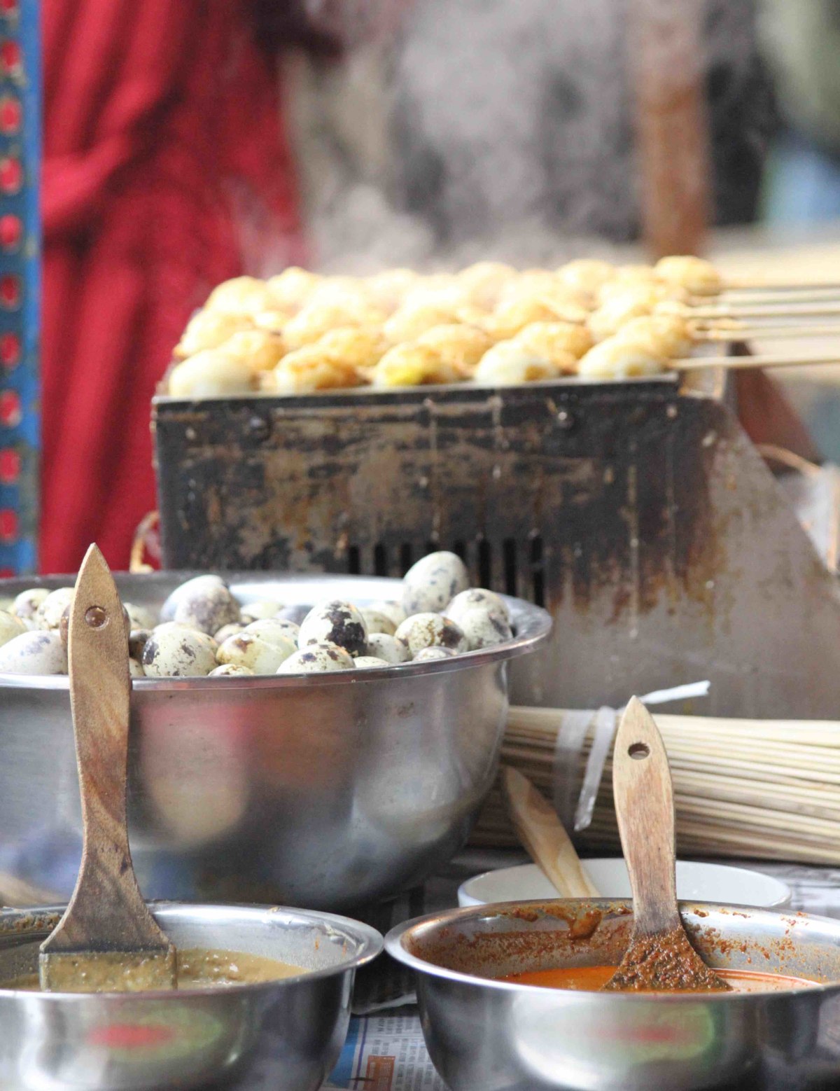 Grilled quail eggs with your choice of sauces