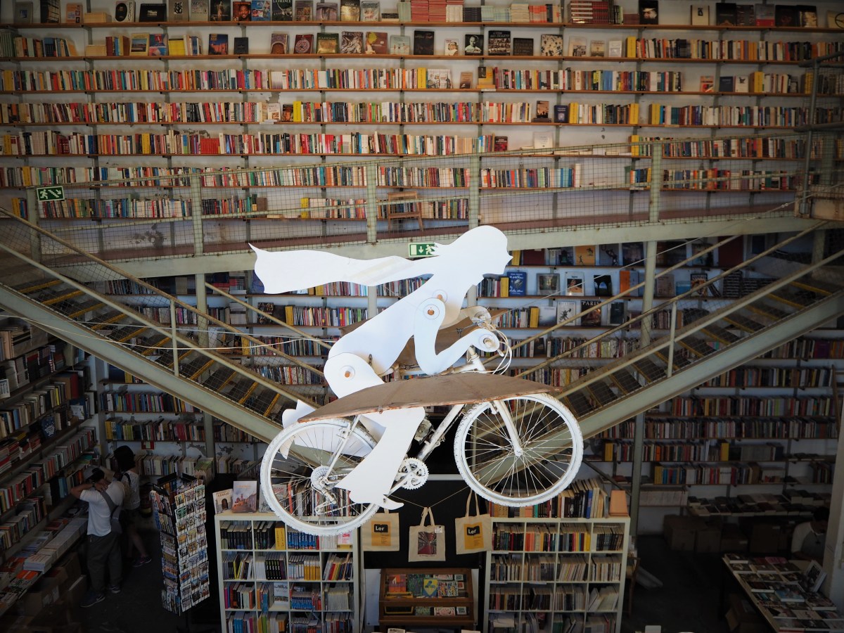 \x22Ler Devagar\x22 bookstore and its flying bicycle.