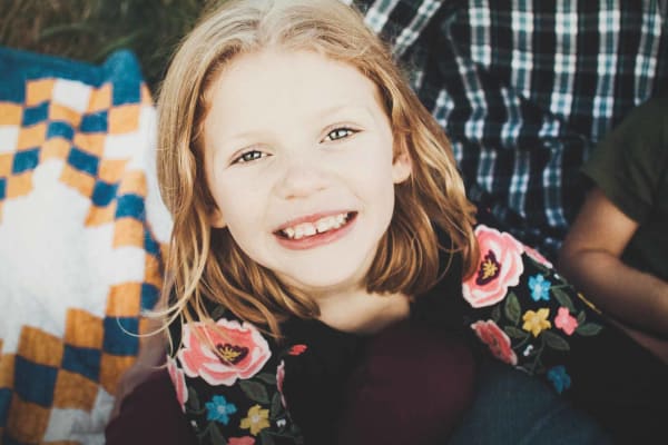 Child in orthodontic treatment smiling