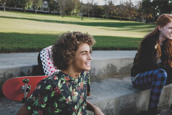 Teen with Invisalign Teen clear aligner tray