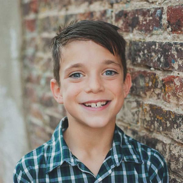 New child orthodontic patient smiling before treatment