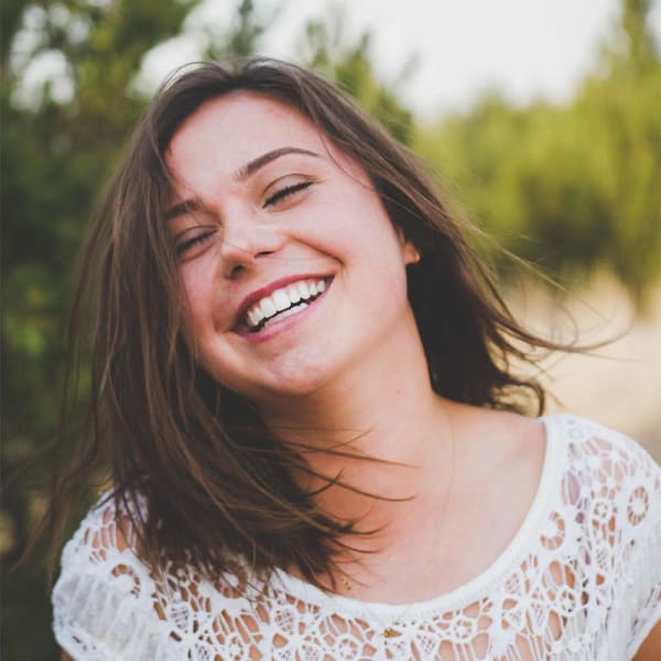 Smiling teen with straightened teeth