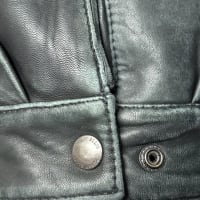 Leather Jacket with scratches and color scuff marks