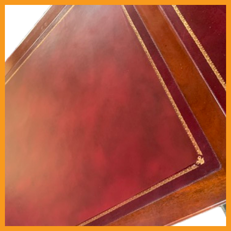 Step 1 of leather desk restoration showing assessment and cleaning process Step 1 of leather desk restoration showing assessment and cleaning process