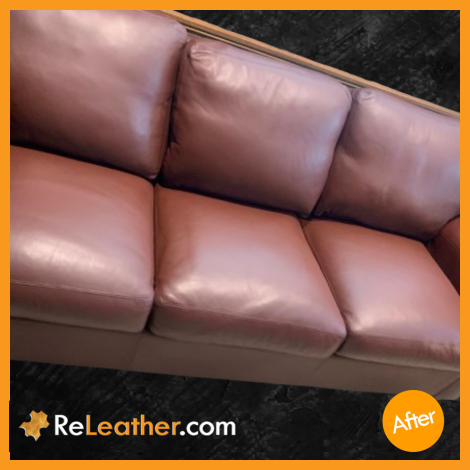 American Leather burgundy sofa after restoration