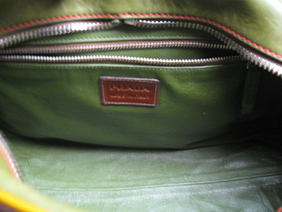 Can you clean the lining of my designer leather purse? - Prada Purse