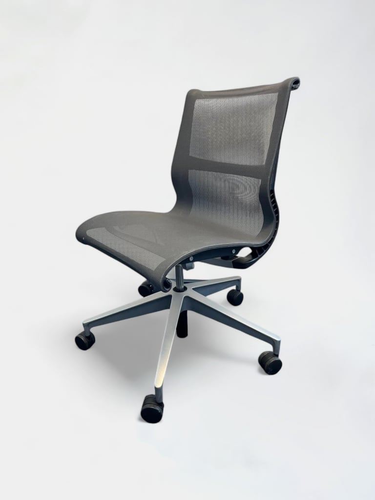 Herman Miller Setu mesh dark grey office chair without armrests on wheels product image 1