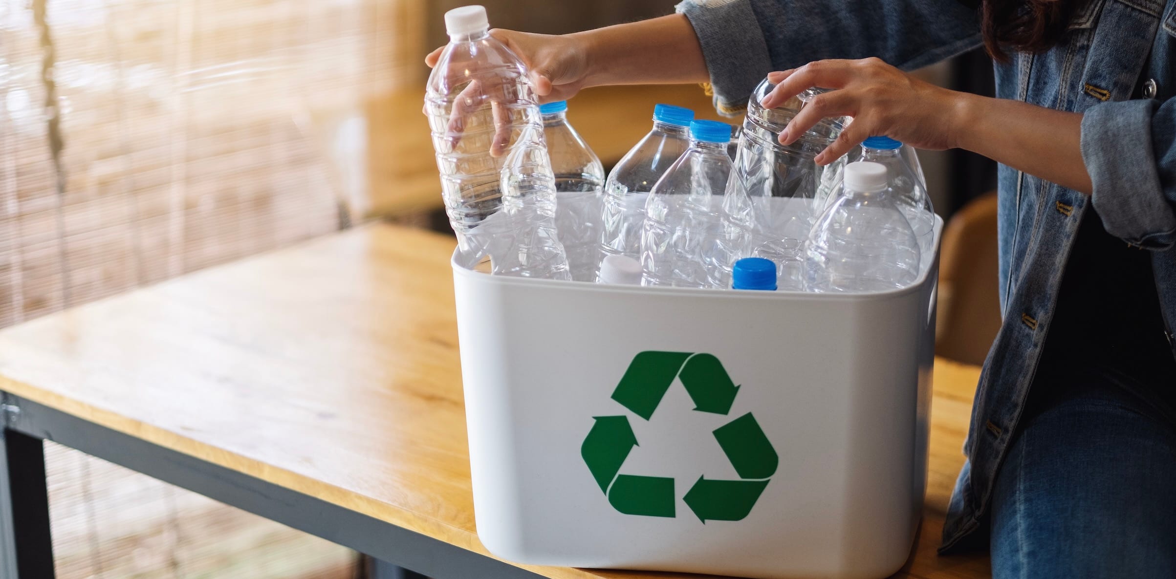 Recycling bin full of plastic bottles