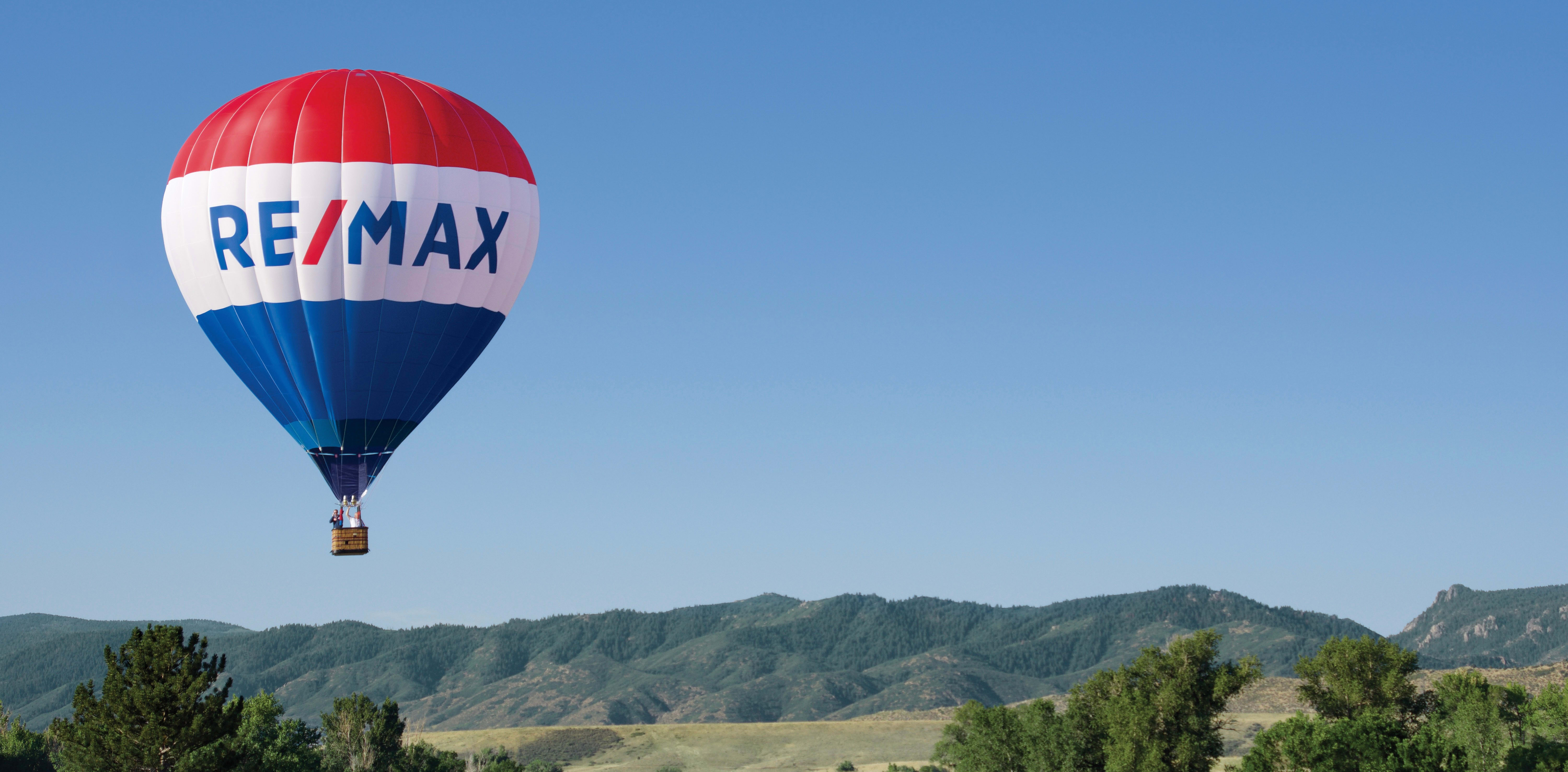 RE/MAX balloon flying in the sky