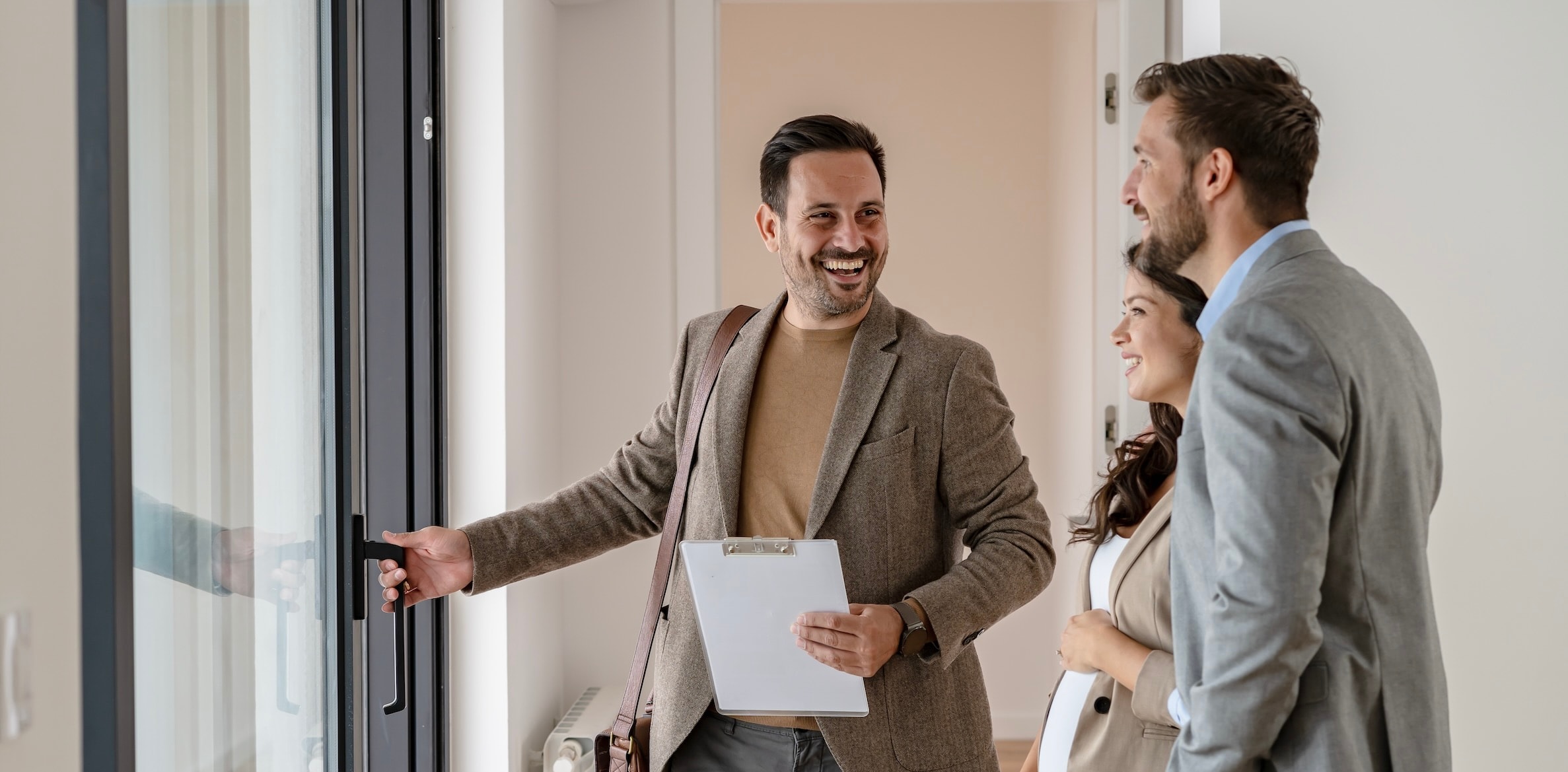 Agent touring a home