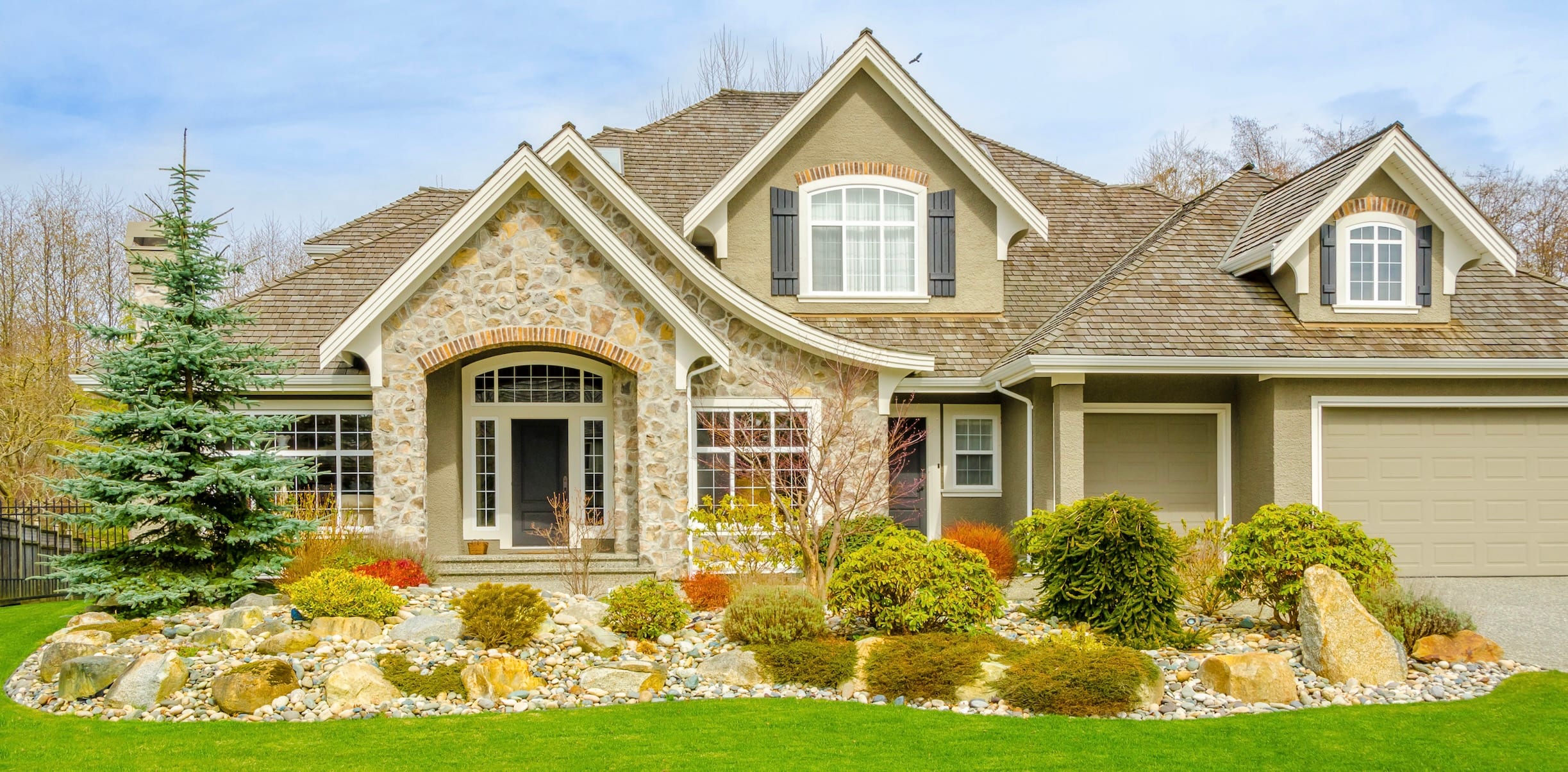 Fall home with green grass
