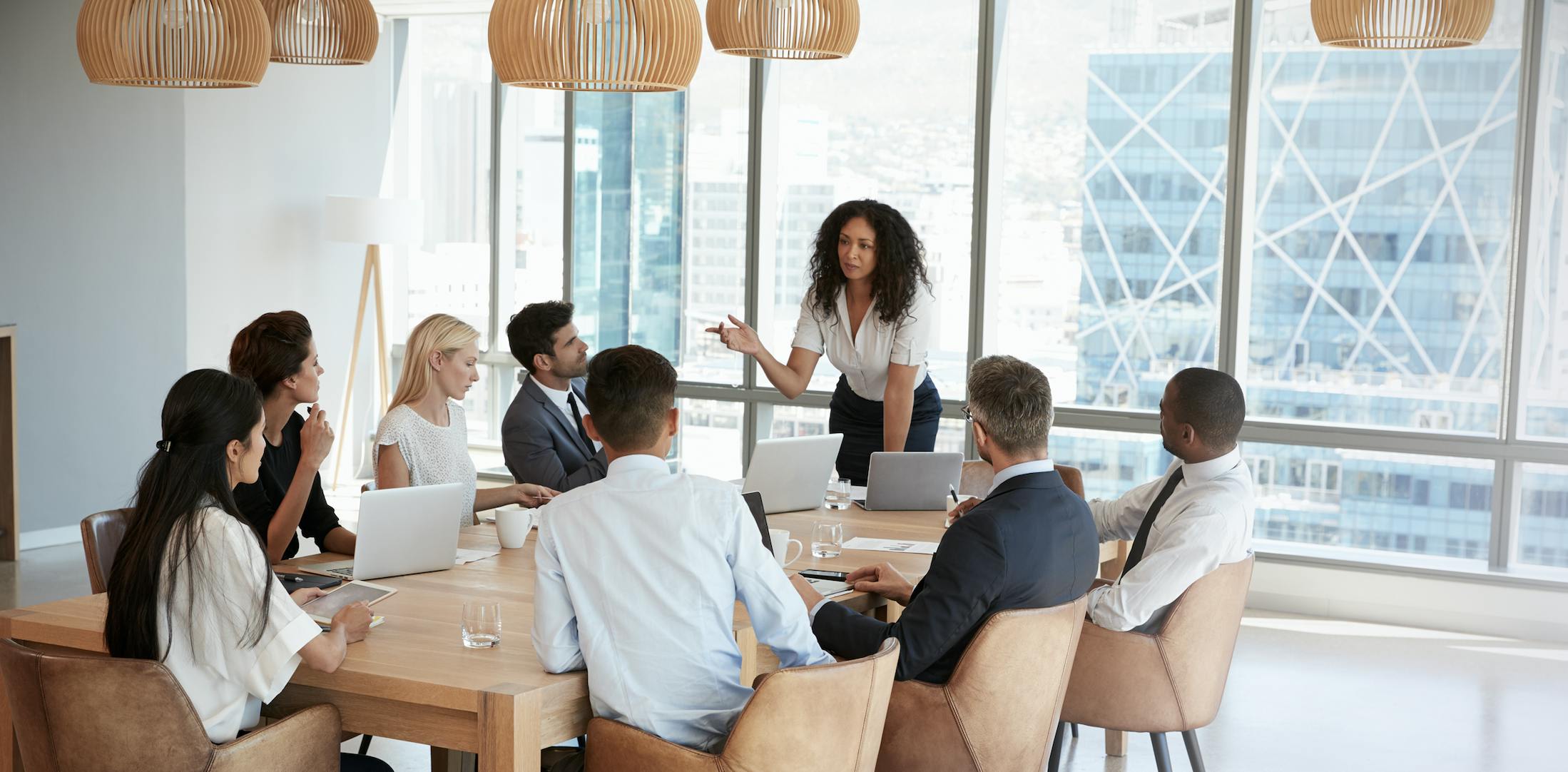 Woman leading business meeting