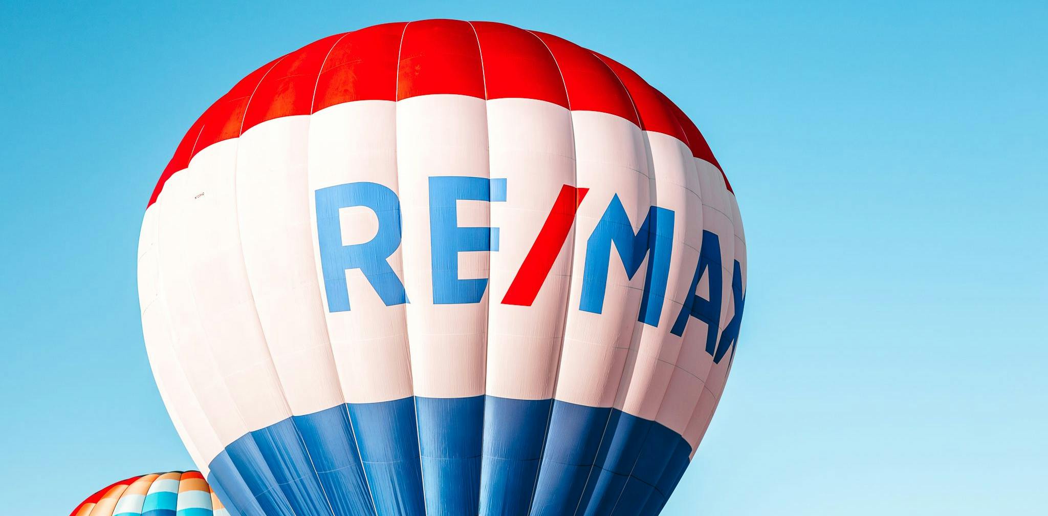 The RE/MAX balloon flying for the Lifting the World Up global event. Photo credit: Missy Miller.